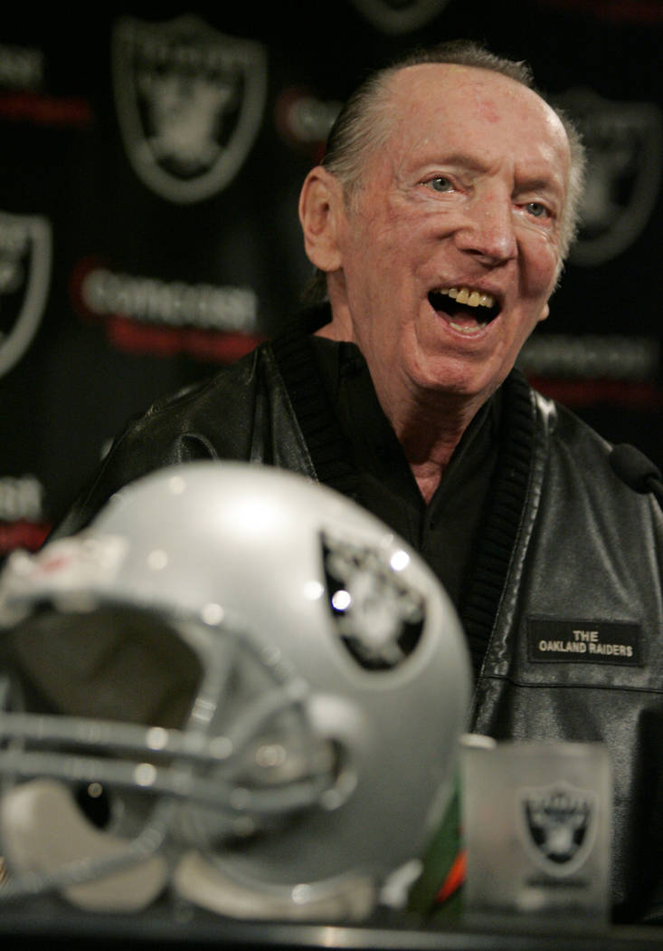 Oakland Raiders owner Al Davis smiles during an NFL football news conference at Raiders headqua ...