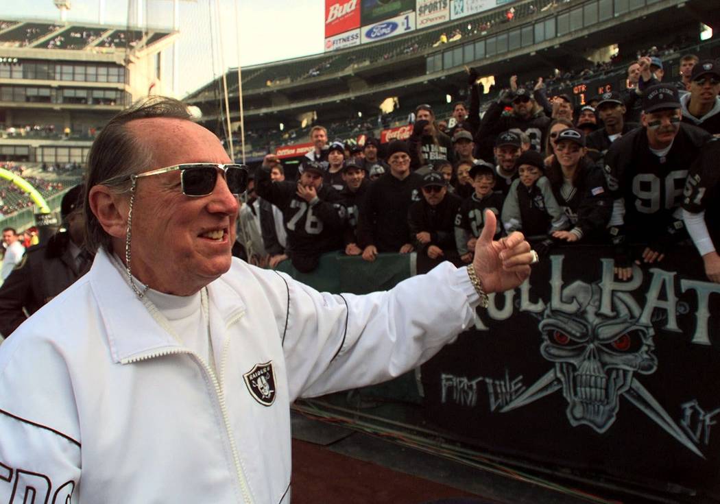 Oakland Raiders owner Al Davis gives a thumbs-up to fans prior to the game with the Kansas City ...