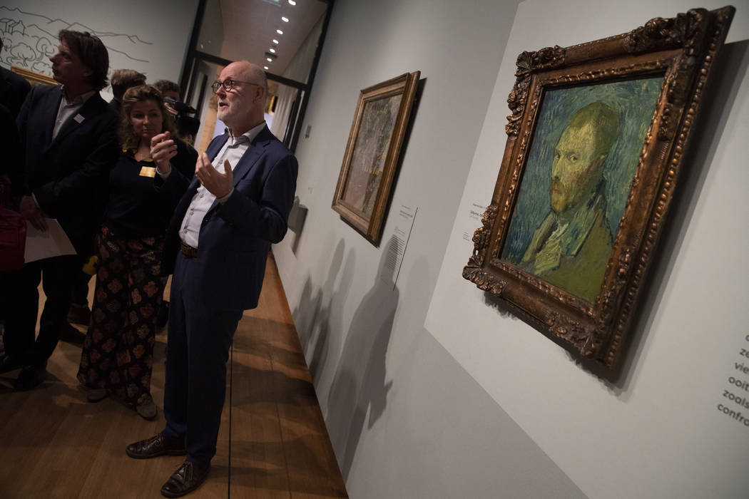 Van Gogh Museum's senior researcher Louis van Tilborgh gestures as he talks to journalists abou ...