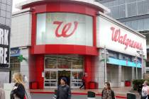 Pedestrians pass the Walgreens on the Strip located at 3765 Las Vegas Blvd. South on Monday, Ja ...