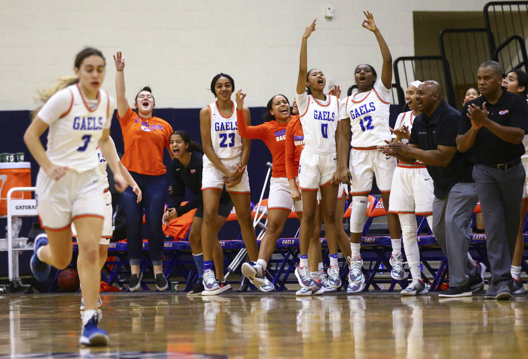 Bishop Gorman players celebrate during the second half of a basketball game against Spring Vall ...