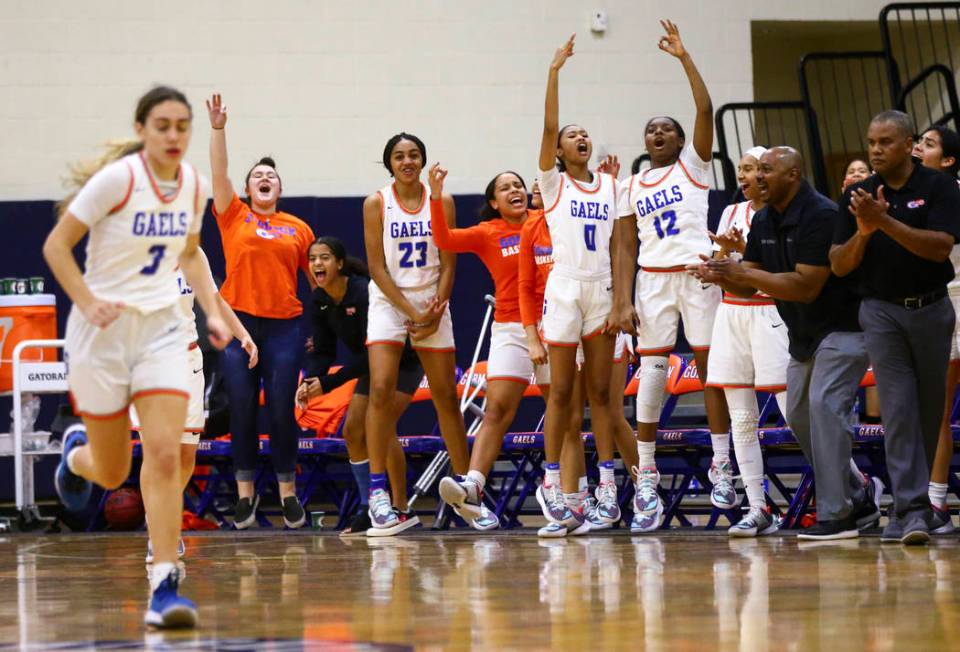 Bishop Gorman players celebrate during the second half of a basketball game against Spring Vall ...