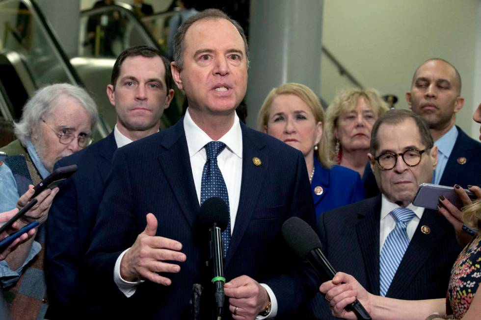 House Intelligence Committee Chairman Adam Schiff, D-Calif., accompanied by the impeachment man ...