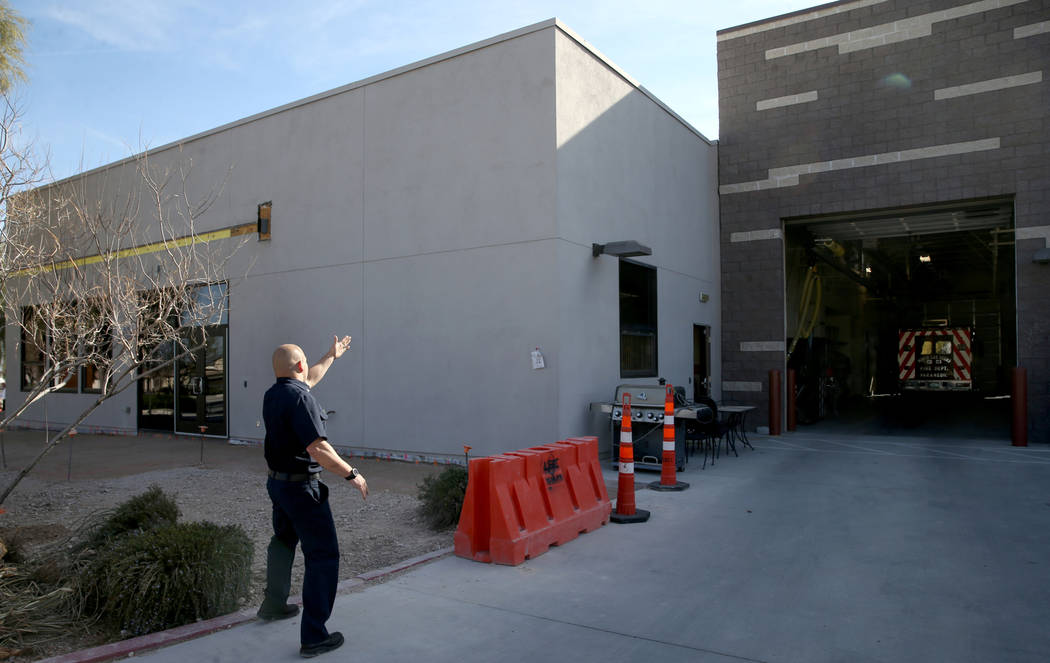 North Las Vegas Fire Capt. Ben Bodine shows how the living quarters separated from engine bays ...