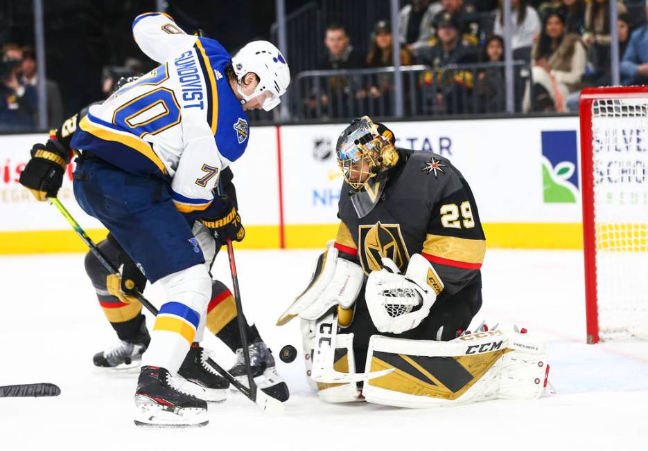 Golden Knights goaltender Marc-Andre Fleury (29) blocks the puck against St. Louis Blues' Oskar ...