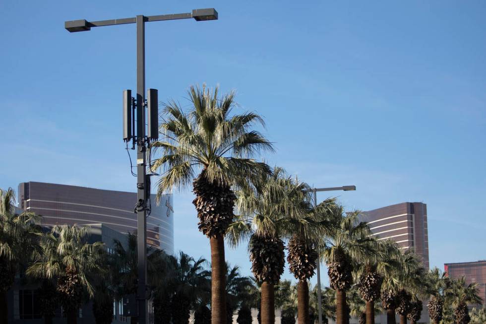 A small cell site is installed on a street light on Flamingo Road on Friday, Jan. 31, 2020, in ...