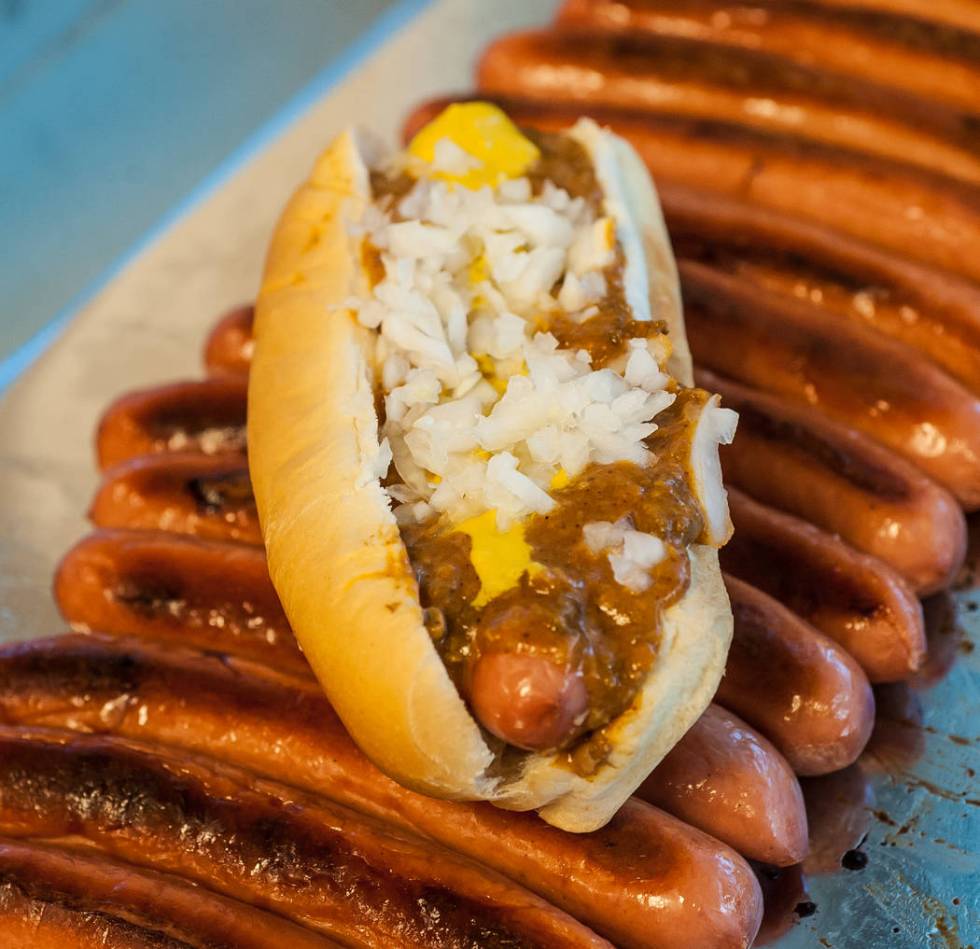 Chili sauce, onions and mustard on a dog at American Coney Island. (American Coney Island)