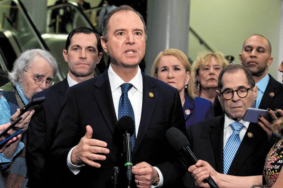 House Intelligence Committee Chairman Adam Schiff, D-Calif., accompanied by the impeachment man ...