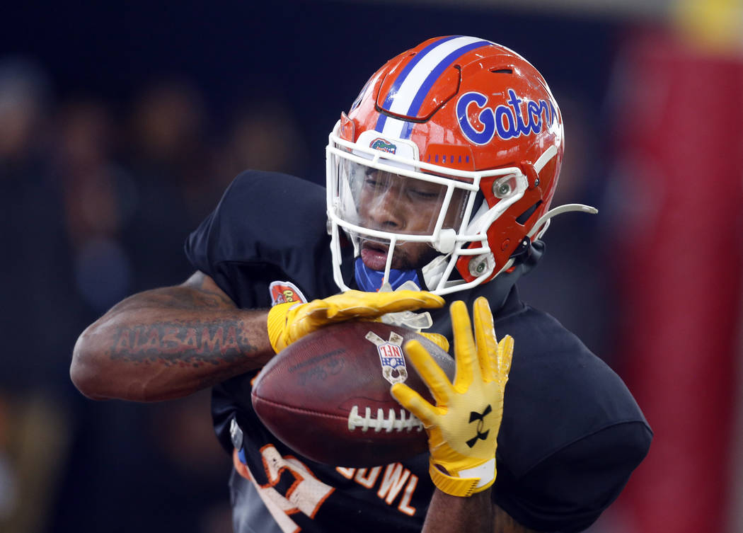 Florida's Lamical Perine catches a pass as the South squad practices for the Senior Bowl Thursd ...
