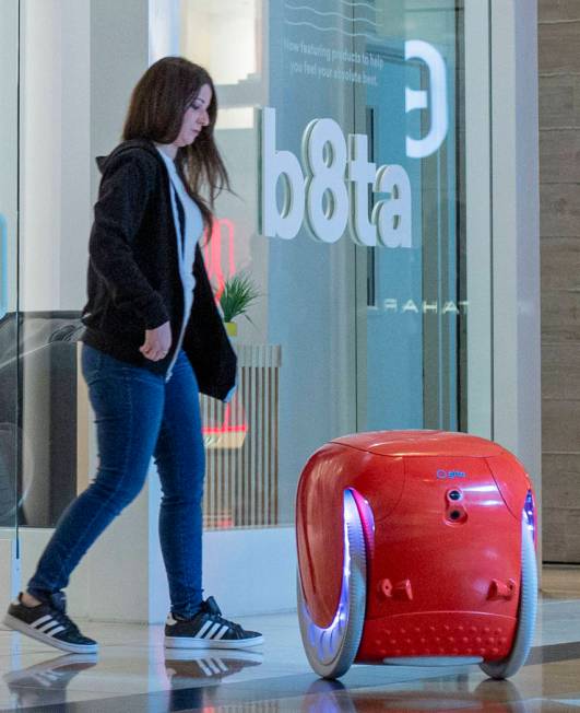 The gita robot follows b8ta store manager Laynie Shrago as she walks backward into the recently ...