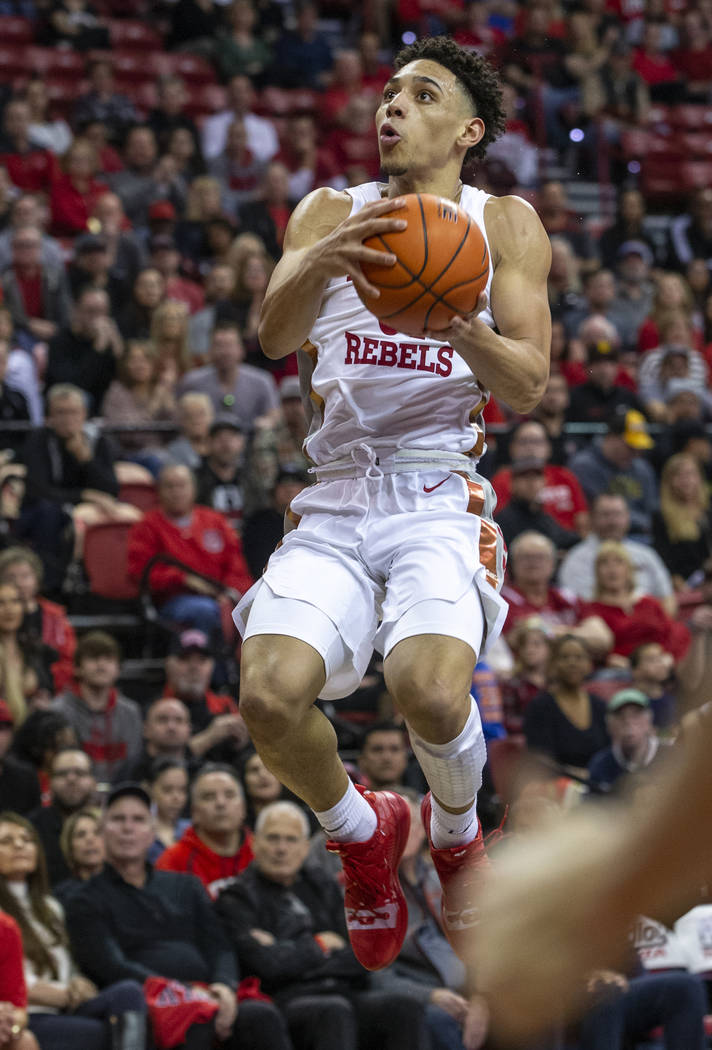 UNLV Rebels guard Marvin Coleman (31) soars to the basket past the San Diego State Aztecs defen ...