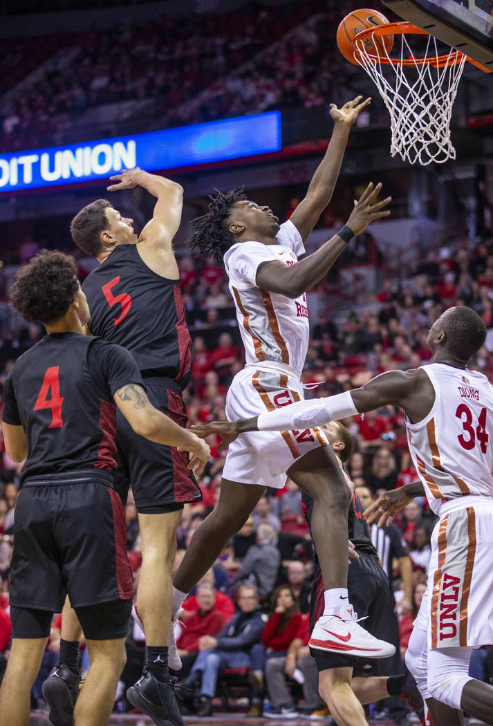 UNLV Rebels forward Donnie Tillman (2,right) gets inside of San Diego State Aztecs forward Matt ...