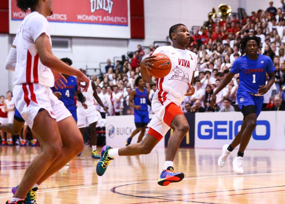 Coronado's Jaden Hardy (1) drives to the basket against Bishop Gorman's Will McClendon (1) duri ...