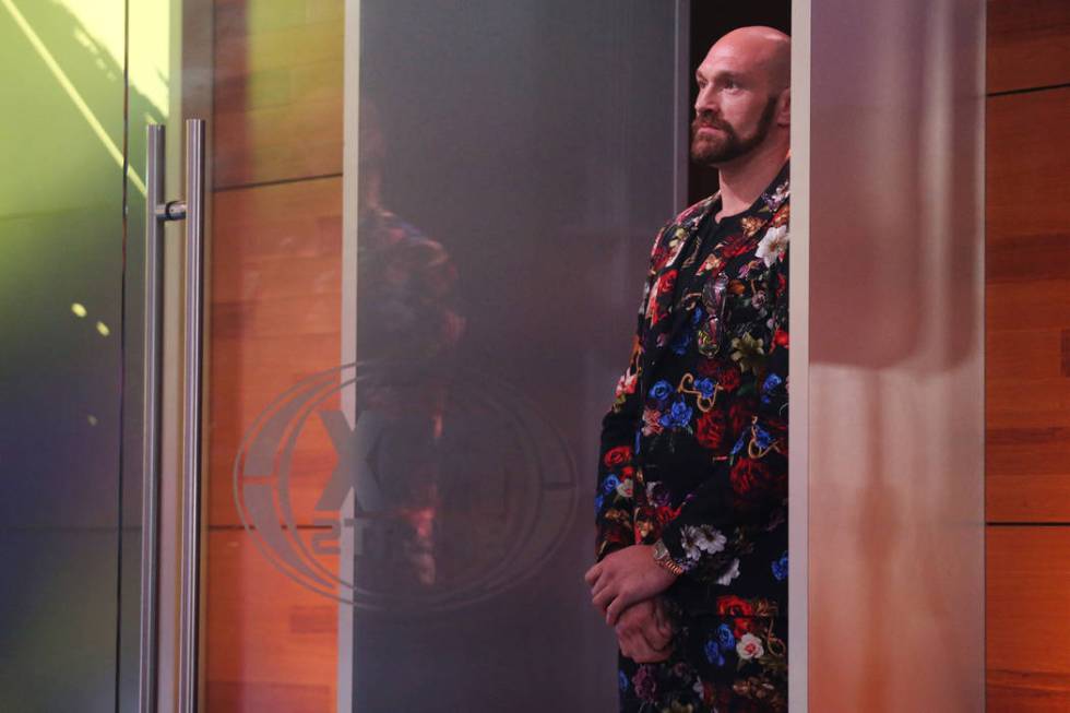 Tyson "The Gypsy King" Fury waits to take the stage during a press conference at the ...