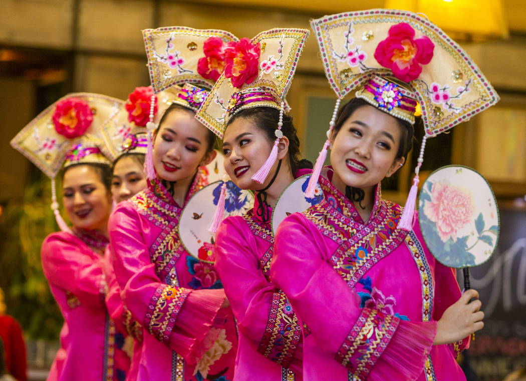 Members of the Shirley Chen dance troupe perform at a reception as the Grand Canal Shoppes cele ...