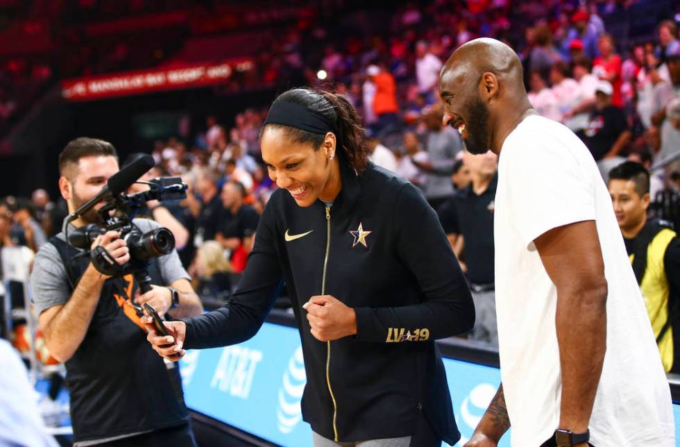 Las Vegas Aces' A'ja Wilson records a video with NBA legend Kobe Bryant before the start of the ...