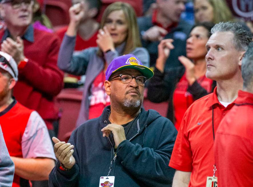 A UNLV Rebels fan wears a Lakers' hat as they take on the San Diego State Aztecs during the sec ...