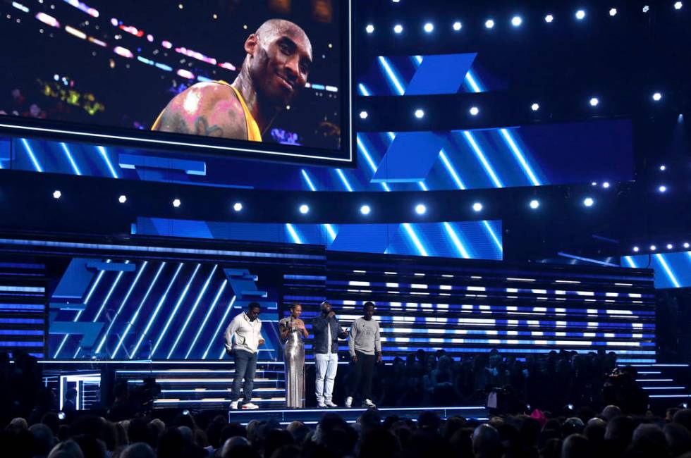 Alicia Keys, second left, and members of Boys II Men, from left, Nathan Morris, Wanya Morris an ...