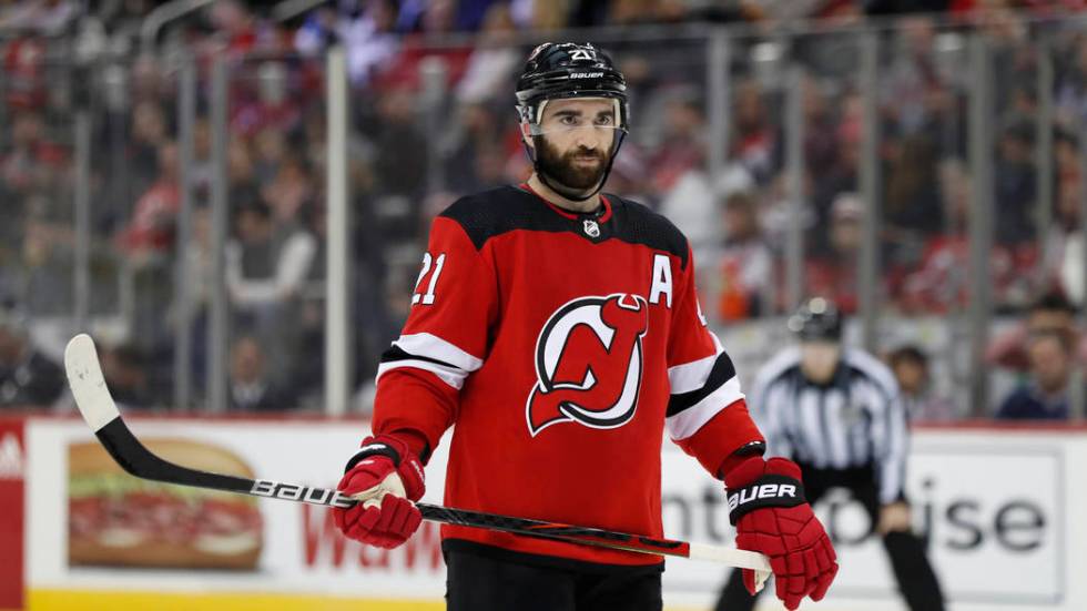 New Jersey Devils right wing Kyle Palmieri (21) before a face-off in the second period of an NH ...