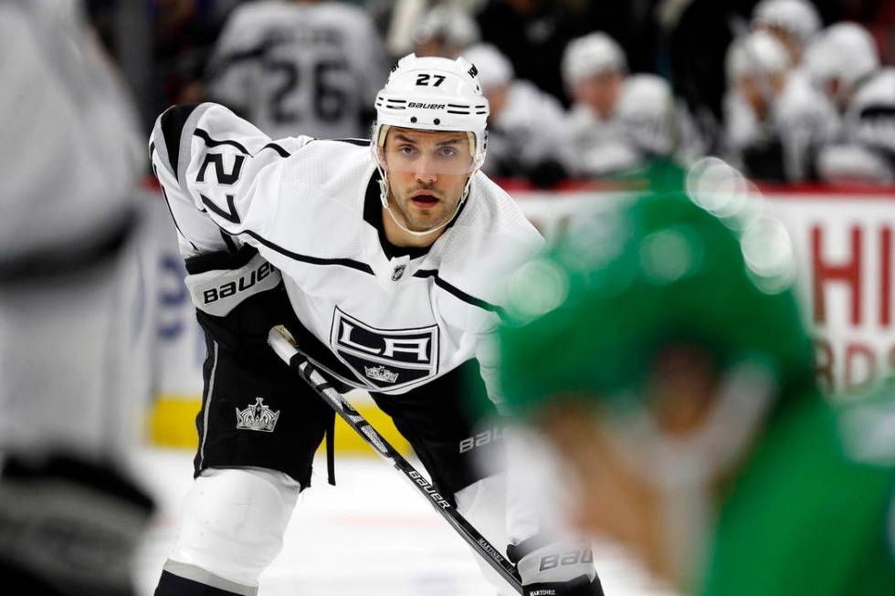 Los Angeles Kings' Alec Martinez (27) waits for a face-off against the Carolina Hurricanes duri ...