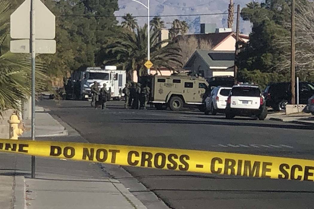Las Vegas police are at the scene of a barricade situation near Washington Avenue and Valley Vi ...