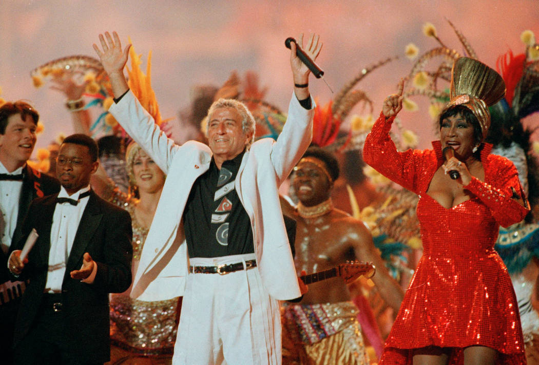 Singers Tony Bennett and Patti LaBelle entertain the crowd during halftime at Super Bowl XXIX, ...
