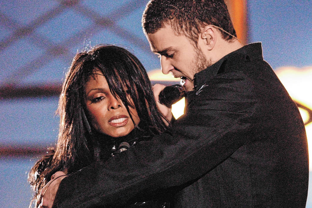 FILE*** Justin Timberlake reaches across Janet Jackson during their performancs just before he ...