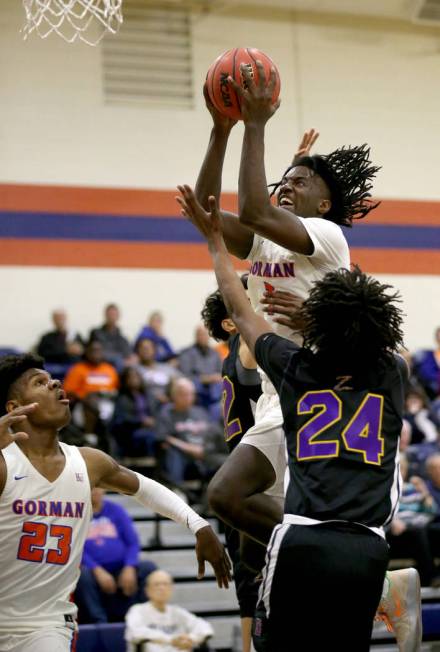 Bishop Gorman guard Will McClendon (1) shoots over Durango Kendrick Gilbert (24) in the first q ...