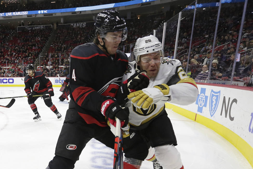 Carolina Hurricanes defenseman Haydn Fleury (4) and Vegas Golden Knights center Paul Stastny (2 ...