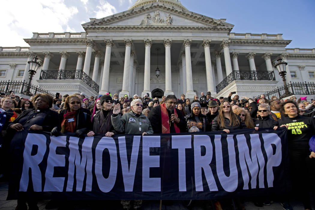 Rev. William Barber along with other demonstrators protest outside of the Capitol, during the S ...