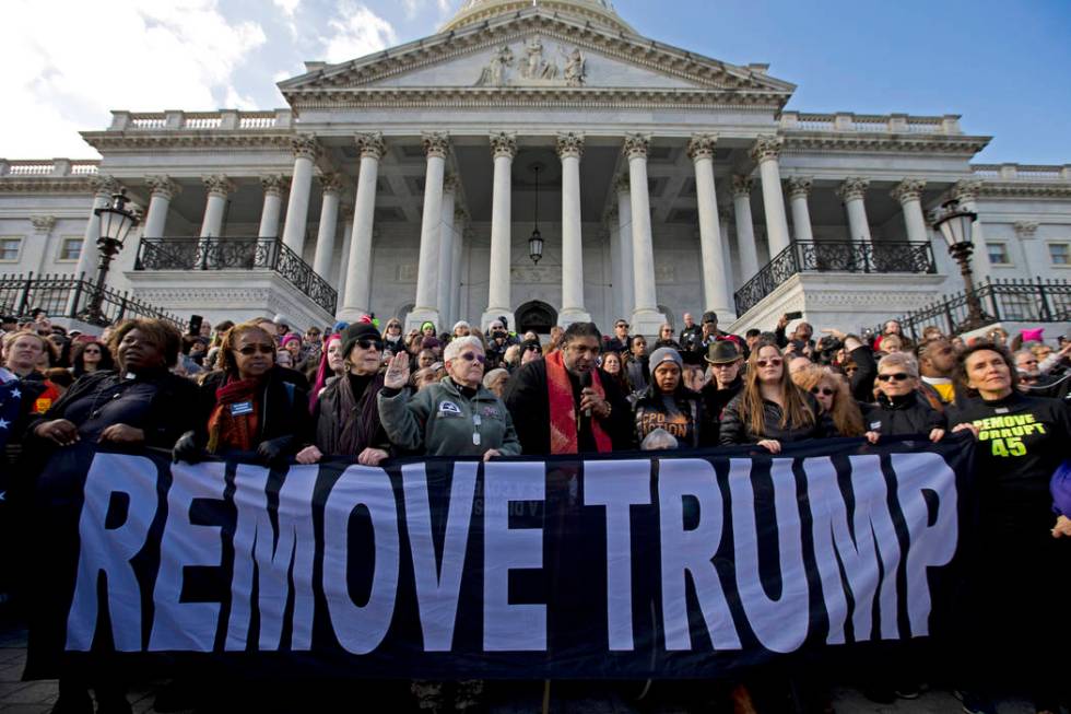 Rev. William Barber along with other demonstrators protest outside of the Capitol, during the S ...