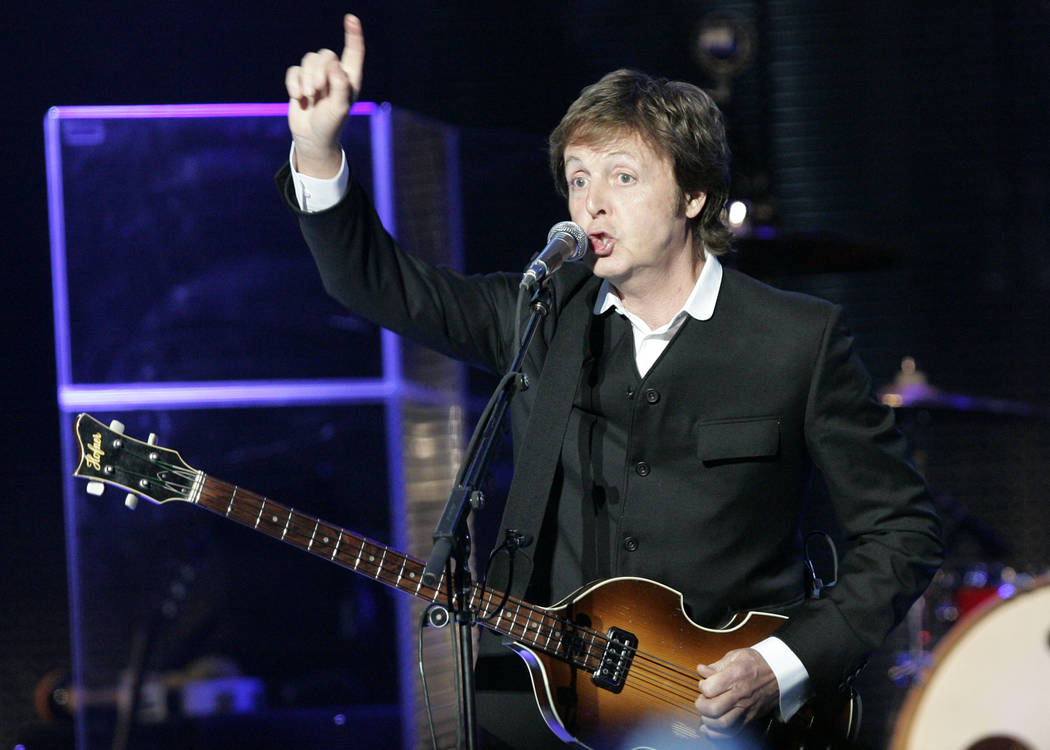 In this April 19, 2009, file photo, legendary rocker Paul McCartney performs at the newly refur ...