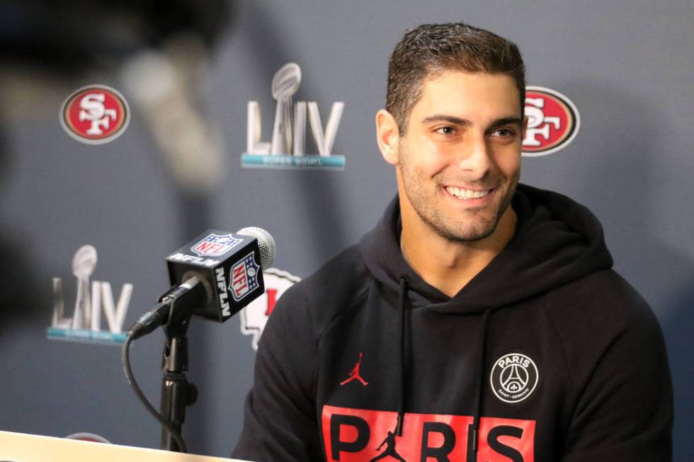 San Francisco 49ers quarterback Jimmy Garoppolo responds to questions during Super Bowl LIV med ...