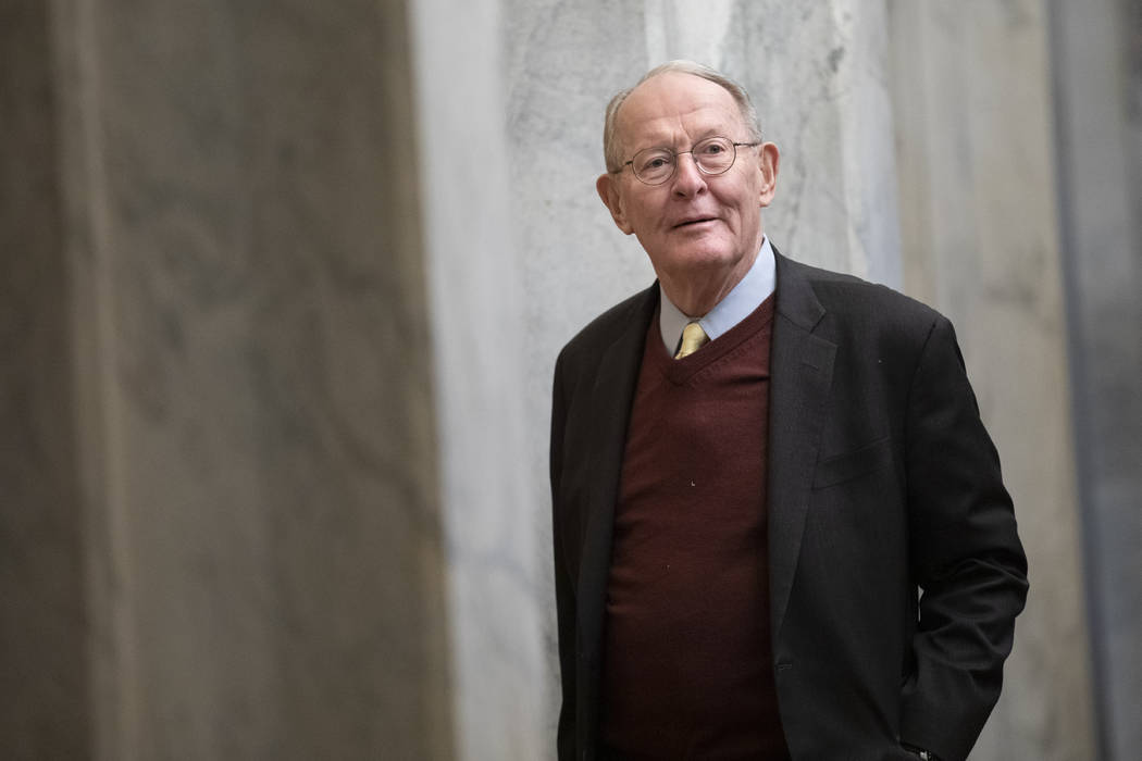 Sen. Lamar Alexander, R-Tenn., arrives on Capitol Hill in Washington, Thursday, Jan. 30, 2020, ...