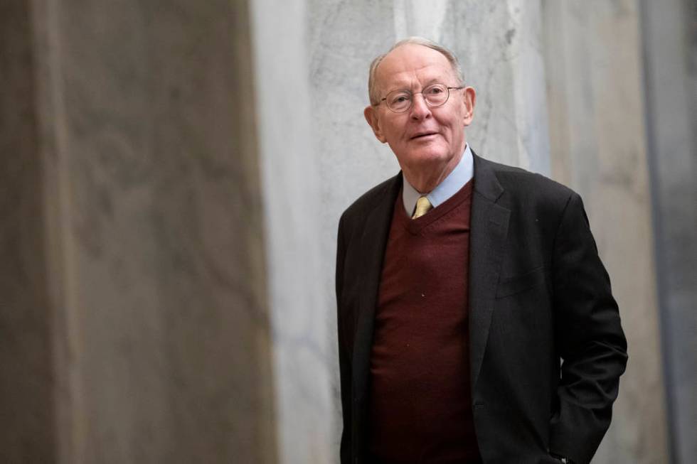 Sen. Lamar Alexander, R-Tenn., arrives on Capitol Hill in Washington, Thursday, Jan. 30, 2020, ...