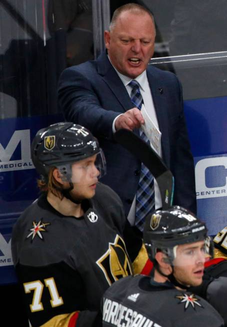Vegas Golden Knights head coach Gerard Gallant talks to his players during the second period of ...