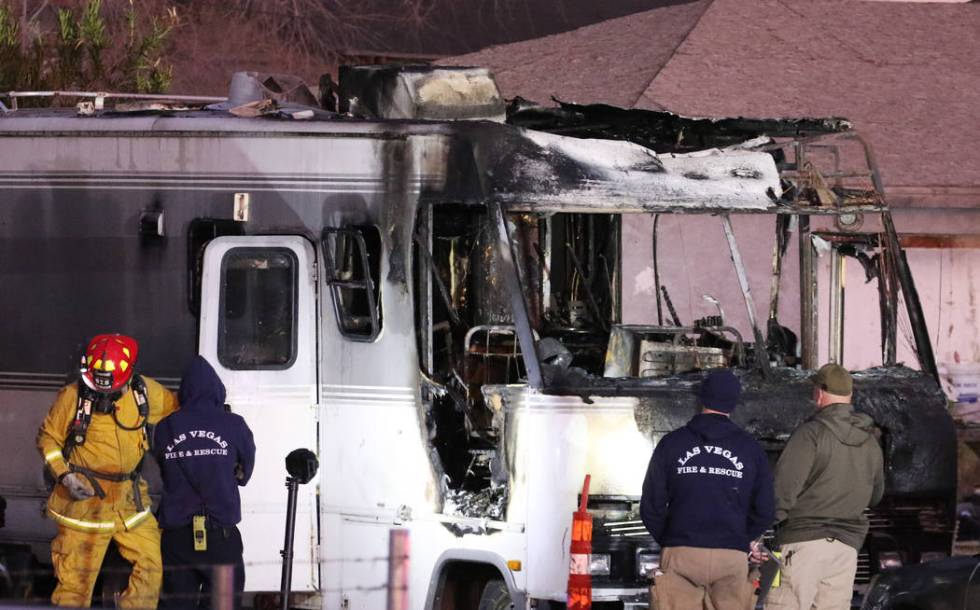 Las Vegas firefighters investigate the cause of a fatal fire in a recreational vehicle near Wes ...