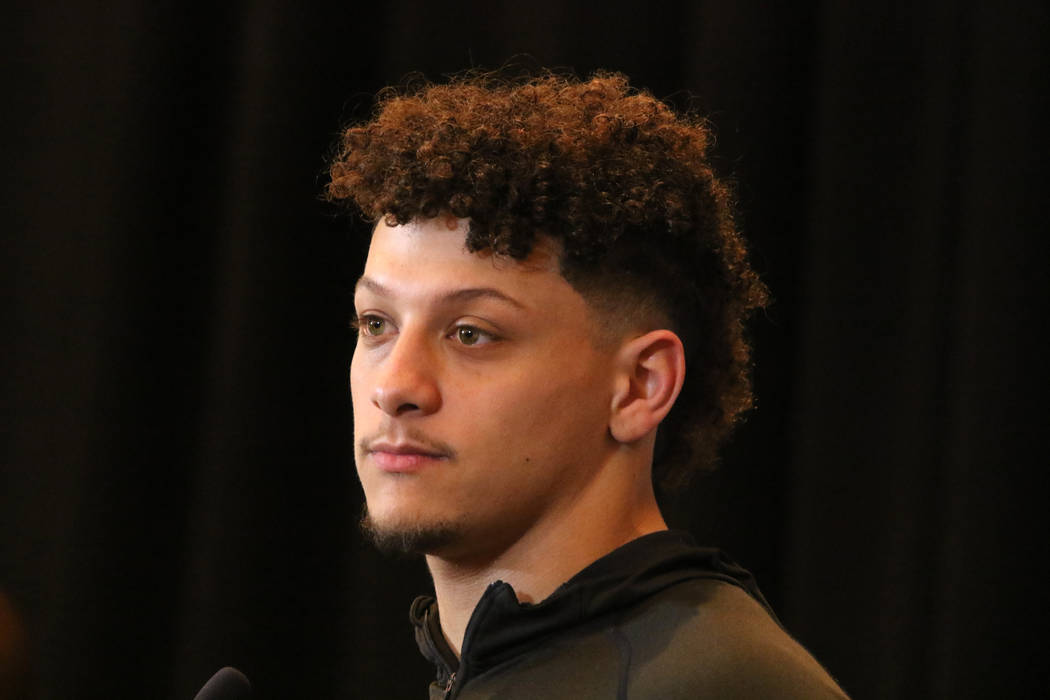 Kansas City Chiefs quarterback Patrick Mahomes takes questions at a news conference during Supe ...