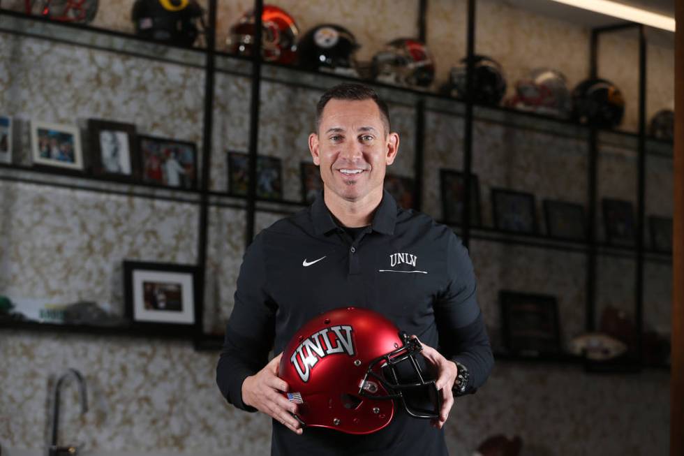 UNLV football head coach Marcus Arroyo is photographed in his office at the Fertitta Football C ...