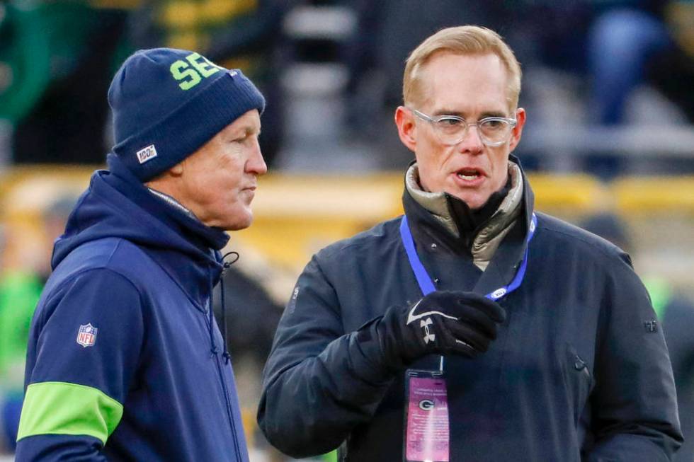 Fox TV's Joe Buck talks to Seattle Seahawks head coach Pete Carroll before an NFL divisional pl ...