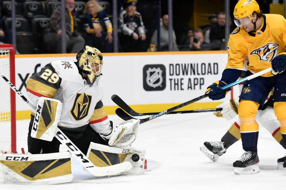 Vegas Golden Knights goaltender Marc-Andre Fleury (29) blocks a shot by Nashville Predators rig ...