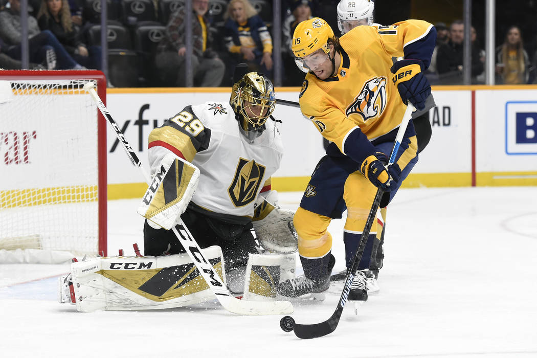 Nashville Predators right wing Craig Smith (15) attempts to shoot against Vegas Golden Knights ...