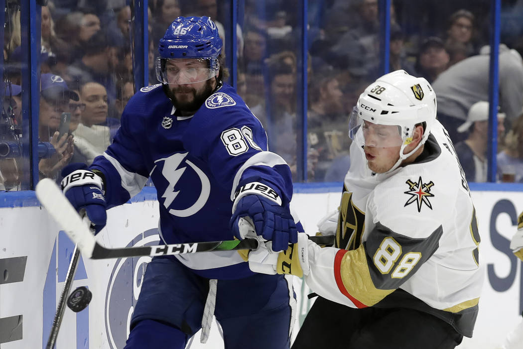 Tampa Bay Lightning right wing Nikita Kucherov (86) and Vegas Golden Knights defenseman Nate Sc ...