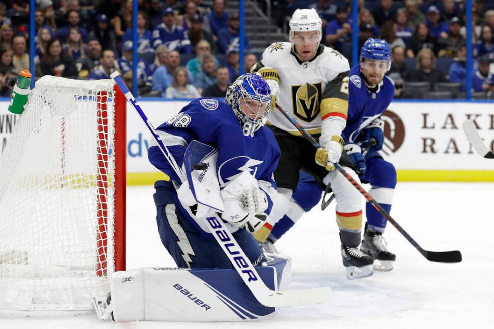 Tampa Bay Lightning goaltender Andrei Vasilevskiy (88) makes a blocker save as Vegas Golden Kni ...