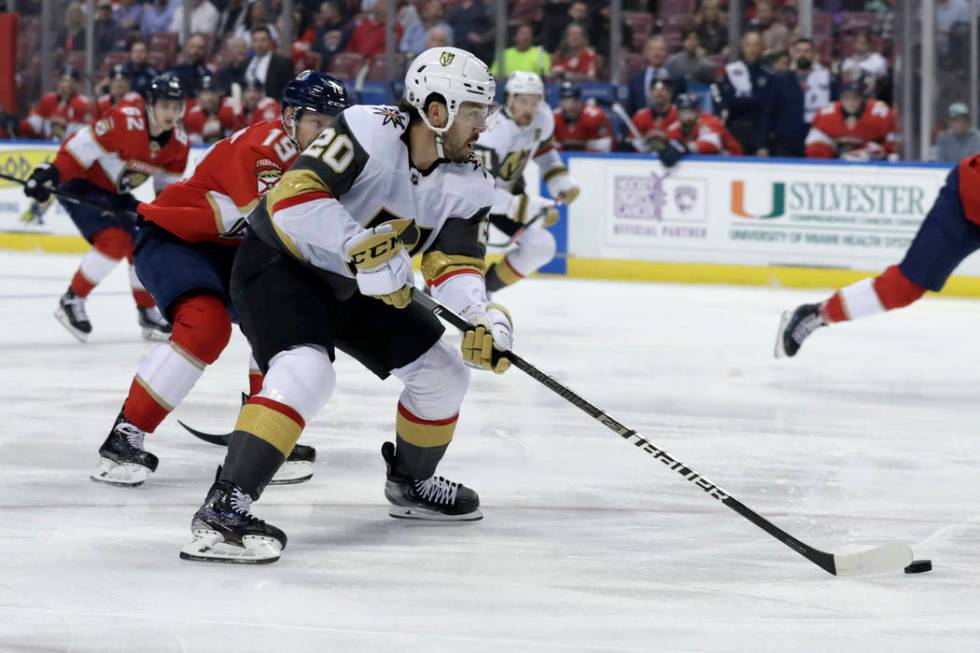 Vegas Golden Knights center Chandler Stephenson (20) skates with the puck as Florida Panthers d ...