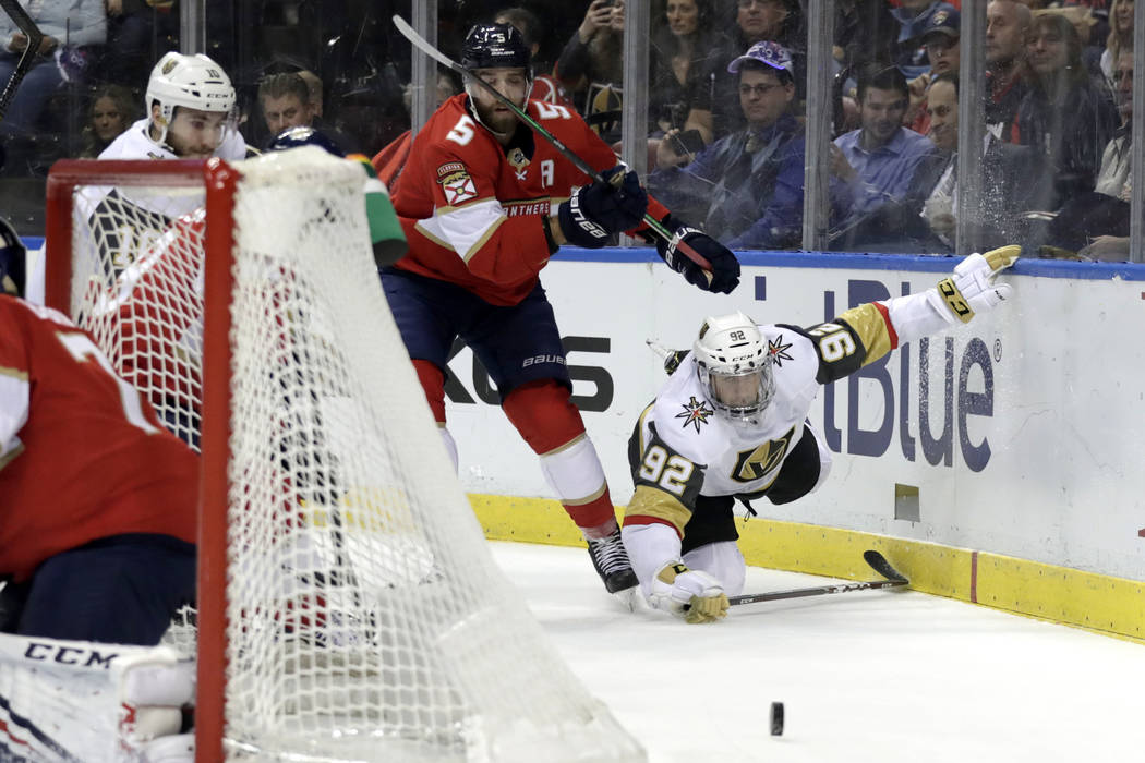 Vegas Golden Knights left wing Tomas Nosek (92) falls to the ice as Florida Panthers defenseman ...