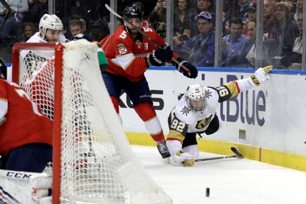 Vegas Golden Knights left wing Tomas Nosek (92) falls to the ice as Florida Panthers defenseman ...