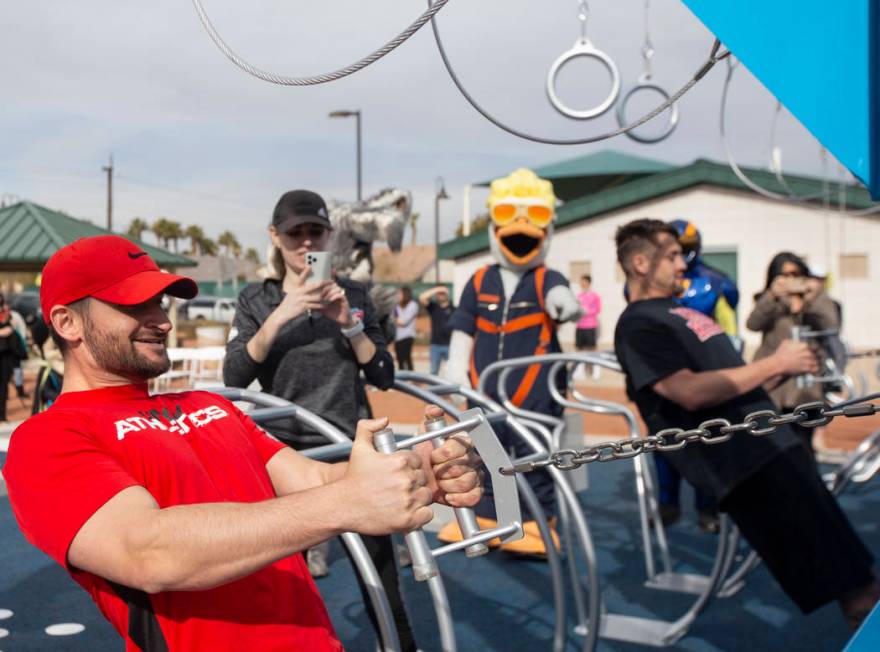 Former UNLV athletes Cody Kastel, left, and Chase Skenandore, right, test out the new outdoor F ...