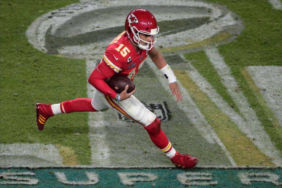 Kansas City Chiefs quarterback Patrick Mahomes (15) runs the football, during the second half o ...