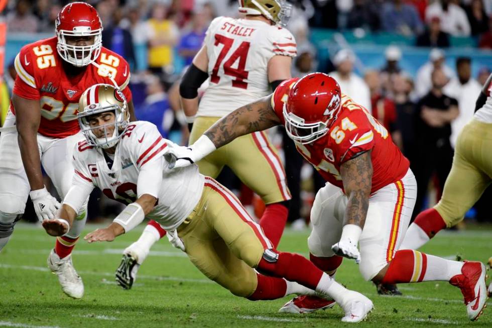 Kansas City Chiefs' Tyreek Hill, center, fails to catch a pass against the San Francisco 49ers ...